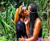 African festival outdoor lesbian make-out from cute couple kissing outdoor