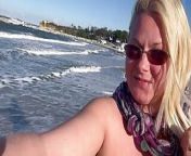 Walking, running and pissingtopless on the public beach from bikini piss