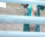 Naked in public. Neighbor saw pregnant neighbor in window who was drying clothes in yard without bra and panties. Nudist from bathing without bra