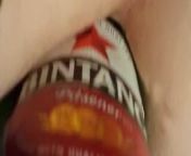 She take a large size beer bottle in her arse from xxx beach australian beer